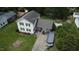 A high aerial view of the spacious home, long driveway and ample yard at 309 Westfield Dr, Dunn, NC 28334