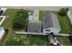 Birds-eye view showcasing the home's backyard, white fencing, and outdoor storage at 309 Westfield Dr, Dunn, NC 28334