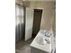 This bathroom features double sinks and vanities with an adjoining closet at 309 Westfield Dr, Dunn, NC 28334