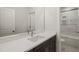 Bathroom featuring modern vanity, hard-surface counter, large mirror, and separate shower/tub at 310 Pilot Ridge Rd, Zebulon, NC 27597