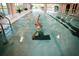 Indoor swimming pool with lane markers, and swimmer at 33 Calluna Dr, Clayton, NC 27520