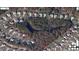Aerial view of a neighborhood with mature trees and a home with a spacious backyard at 338 Howland Ct, Creedmoor, NC 27522