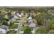 A neighborhood street surrounded by mature trees features well maintained houses at 338 Howland Ct, Creedmoor, NC 27522