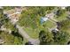 Aerial view of the property and neighborhood in a wooded area at 401 Crestview Dr Dr, Durham, NC 27712