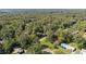 Aerial view of wooded neighborhood with roads winding through the trees at 401 Crestview Dr Dr, Durham, NC 27712