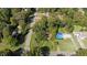 Aerial view of the neighborhood showing the property and surrounding trees at 401 Crestview Dr Dr, Durham, NC 27712