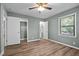 Bedroom with a ceiling fan, wood flooring and light gray walls at 401 Crestview Dr Dr, Durham, NC 27712