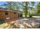 Attached garage and a brick-paved section with a paved driveway at 401 Crestview Dr Dr, Durham, NC 27712