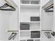 Spacious walk-in closet with custom shelving and hanging rods provides ample storage space at 434 Robin Rd, Chapel Hill, NC 27516