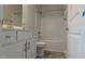 Well-appointed bathroom featuring a vanity and a shower-tub combo, offering comfort and style at 457 Sweet Potato Lane # 13, Nashville, NC 27856
