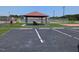 Outdoor recreational area with tennis courts, a covered picnic area, and surrounding parking for community gatherings at 457 Sweet Potato Lane # 13, Nashville, NC 27856