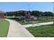 Community playground with a covered play area and surrounding green space for outdoor recreation and Gathering enjoyment at 457 Sweet Potato Lane # 13, Nashville, NC 27856