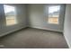 Cozy bedroom with two windows, plush carpet and ample natural light at 473 Sweet Potato Lane # 12, Nashville, NC 27856