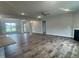 Spacious living room featuring hardwood floors, a ceiling fan and lots of natural light at 473 Sweet Potato Lane # 12, Nashville, NC 27856