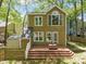 View of back exterior with a nice deck and backyard ready for outdoor activities at 4969 Royal Adelaide Way, Raleigh, NC 27604