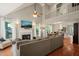 Bright living room with a high ceiling, fireplace, and hardwood floors that create a cozy atmosphere at 4969 Royal Adelaide Way, Raleigh, NC 27604