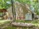 Side exterior view of a home showcasing a storage shed at 4969 Royal Adelaide Way, Raleigh, NC 27604