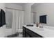 Bathroom featuring a shower-tub combo and modern fixtures, providing a clean and functional space at 520 Austin View Blvd, Wake Forest, NC 27587