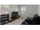 Cozy bedroom with natural light, carpeted floors, and a comfortable sleeping space at 520 Austin View Blvd, Wake Forest, NC 27587