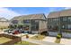 Attractive townhome exteriors with balconies and attached garages in a row at 520 Austin View Blvd, Wake Forest, NC 27587