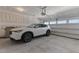 Spacious garage featuring a new white Acura RDX, with an automatic door and plenty of room at 520 Austin View Blvd, Wake Forest, NC 27587