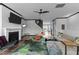 Open concept living room with a fireplace, contemporary decor, and an inviting atmosphere at 520 Austin View Blvd, Wake Forest, NC 27587