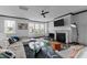 Bright living room with fireplace, modern furnishings, and ample natural light at 520 Austin View Blvd, Wake Forest, NC 27587