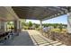View of the outdoor grill area with a stone surround and seating at 520 Austin View Blvd, Wake Forest, NC 27587