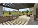 View of the outdoor grill area with a stone surround and seating at 520 Austin View Blvd, Wake Forest, NC 27587