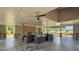 Inviting pavilion interior with seating, fireplace, and ceiling fans for outdoor gathering at 520 Austin View Blvd, Wake Forest, NC 27587