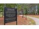 Fitness course with sign explaining directions to exercise at 520 Austin View Blvd, Wake Forest, NC 27587