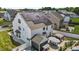 Aerial shot of backyard featuring the solar panels, the patio, and fence at 528 Brycewood Dr, Burlington, NC 27215