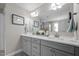 Bathroom featuring double vanity, granite countertops, soft lighting, and tiled backsplash at 528 Brycewood Dr, Burlington, NC 27215