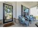 Cozy front porch with seating and decorative wreath on the front door at 528 Brycewood Dr, Burlington, NC 27215