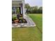 Professionally landscaped yard with stone walkway, mulch and vibrant plants adding beauty to the home's exterior at 528 Brycewood Dr, Burlington, NC 27215