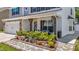 Inviting front porch with manicured landscaping and a stone pathway leading to the entrance at 528 Brycewood Dr, Burlington, NC 27215
