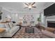 Comfortable living room features a fireplace, large windows, and stylish decor at 528 Brycewood Dr, Burlington, NC 27215