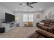 Inviting living area with a large TV, plush seating, and natural light from the window at 528 Brycewood Dr, Burlington, NC 27215