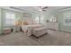 Beautiful main bedroom with tray ceiling, bench seat, and lovely natural light at 528 Brycewood Dr, Burlington, NC 27215