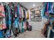 Spacious walk-in closet with ample storage for shoes, handbags, and hanging clothes at 528 Brycewood Dr, Burlington, NC 27215
