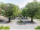 A backyard has a gravel walkway lined with trees and leads to a charming shed at 5420 Deer Forest Trl, Raleigh, NC 27614