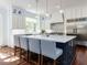 Beautiful kitchen features a large center island with seating and modern stainless steel appliances at 5420 Deer Forest Trl, Raleigh, NC 27614