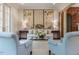 Sophisticated living room with French doors, columns, and stylish decor at 5420 Deer Forest Trl, Raleigh, NC 27614