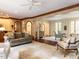 Inviting open-concept living area with fireplace, hardwood floors, and natural light at 5420 Deer Forest Trl, Raleigh, NC 27614