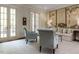 Bright living room with French doors, and stylish seating arrangement at 5420 Deer Forest Trl, Raleigh, NC 27614