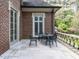 A beautiful brick patio with a table and chairs offers a great outdoor space at 5420 Deer Forest Trl, Raleigh, NC 27614