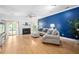 Cozy living room featuring a fireplace, stylish seating, and bright natural light at 6001 Winterpointe Ln # 102, Raleigh, NC 27606
