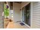 Patio with vinyl siding, concrete patio and glass sliding door at 6001 Winterpointe Ln # 102, Raleigh, NC 27606