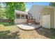 Well-maintained backyard featuring a patio and a screened-in porch at 604 Sinewell Dr, Wake Forest, NC 27587