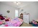 Cheerful bedroom featuring a comfy bed, dresser, and bright decor at 604 Sinewell Dr, Wake Forest, NC 27587